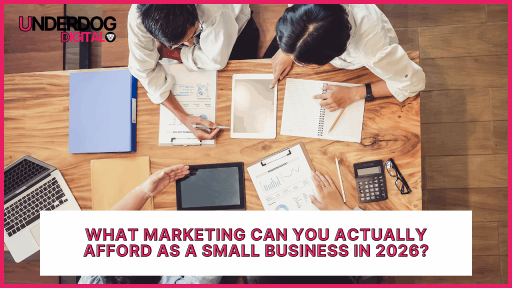 Small business owner reviewing affordable marketing budget and strategy options for 2026 growth